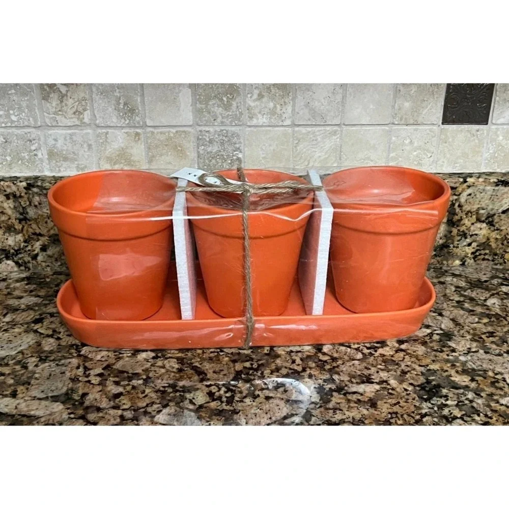 Rae Dunn orange GHOST, GOBLIN and GHOUL Halloween planters.‎